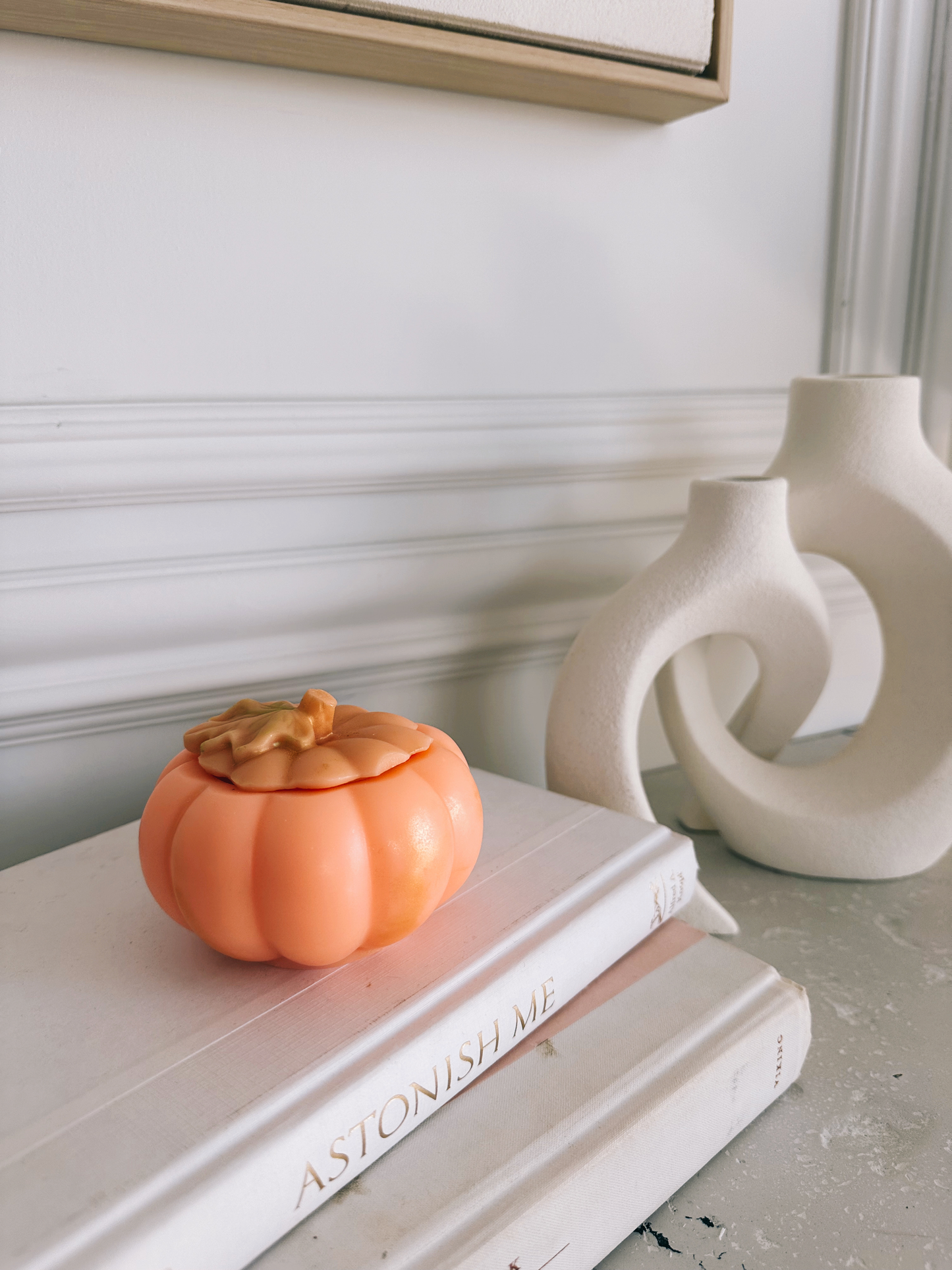 Pumpkin Decor Candle. Elevate your autumn ambience with our exquisite handmade decor pumpkin candles. Made with premium soy wax and cotton wicks, these candles are designed to infuse any room with a cozy atmosphere. Choose between the delightful aroma of pumpkin spice or opt for the unscented option for a more subtle touch.