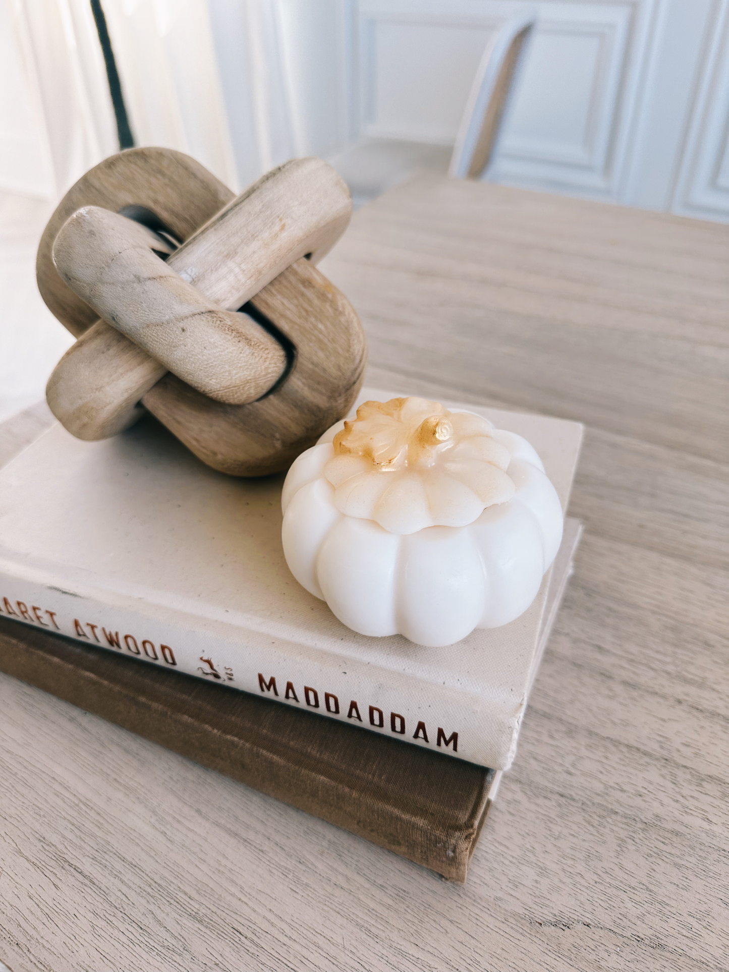 Pumpkin Decor Candle. Elevate your autumn ambience with our exquisite handmade decor pumpkin candles. Made with premium soy wax and cotton wicks, these candles are designed to infuse any room with a cozy atmosphere. Choose between the delightful aroma of pumpkin spice or opt for the unscented option for a more subtle touch.