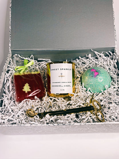 A beautiful gift box, decorated with Soy Candle, Large Bath Bomb, Soap, Candle Wick Trimmer.